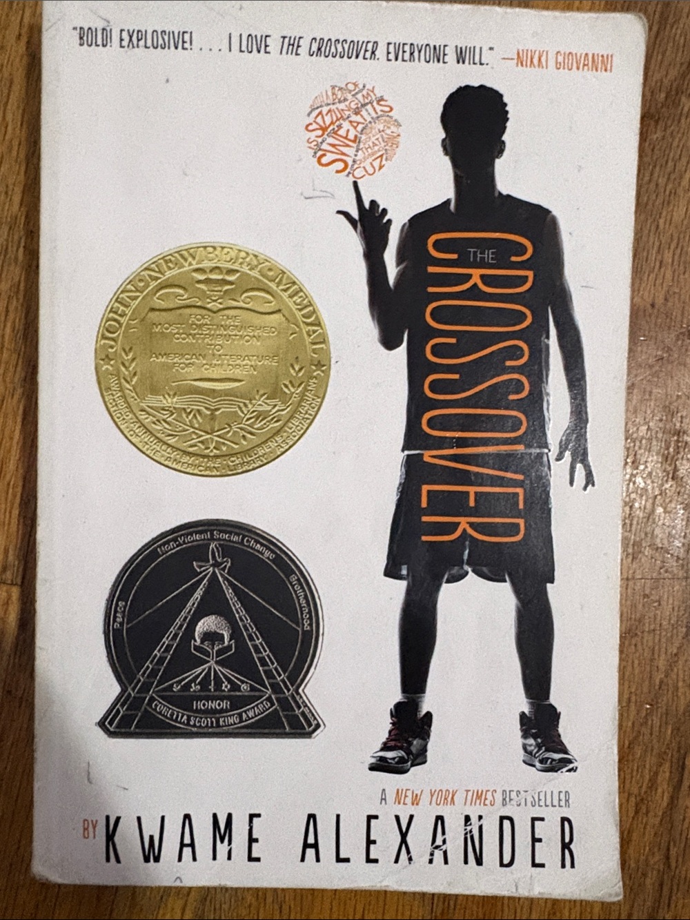 The Crossover by Kwame Alexander - White Cover with Black & Orange Design